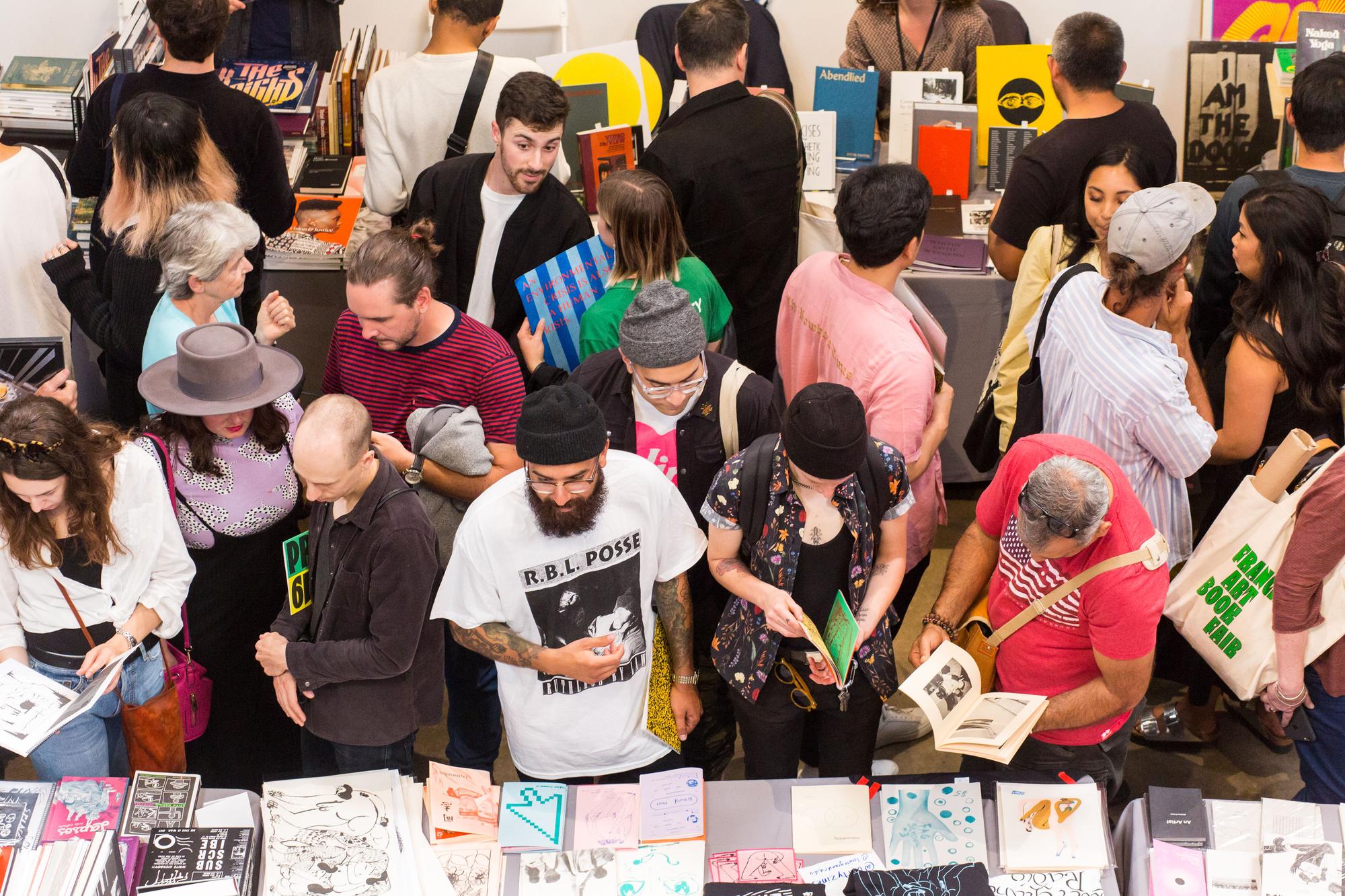 people browse at a book fair