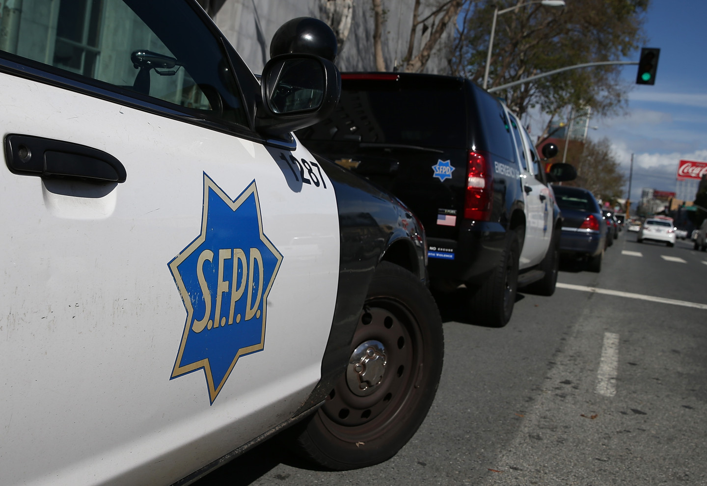 A police car with an emblem reads "S.F.P.D" on it.