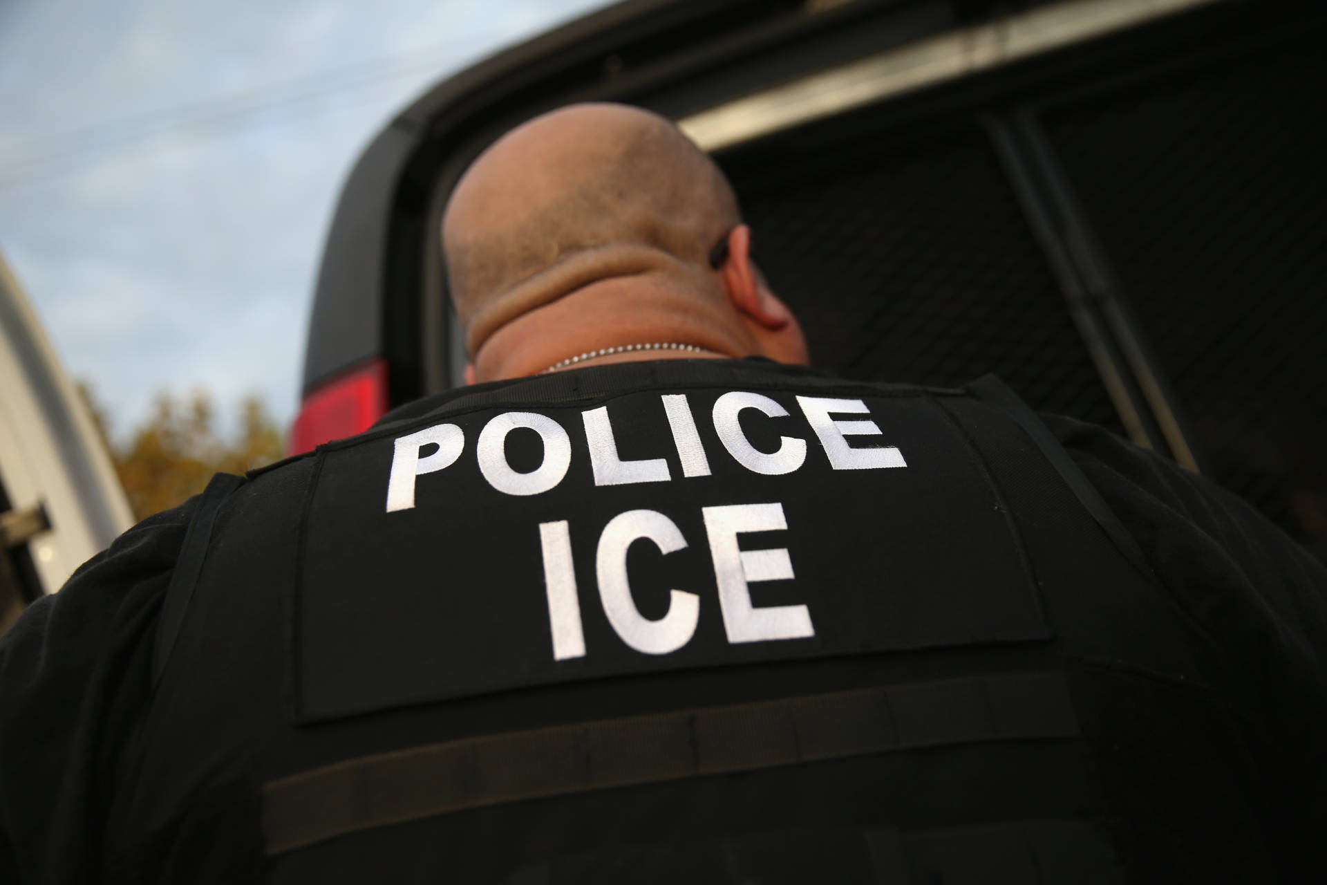 A U.S. Immigration and Customs Enforcement (ICE) agent detains an immigrant in Los Angeles in 2015.