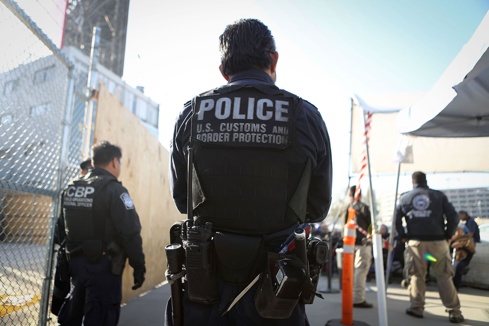 A U.S. Customs and Border Protection officer at the San Ysidro port of entry. One of the U.S.-citizen children separated recently is a seven-year-old boy who was taken from his Mexican mother at the San Ysidro port of entry after the two presented themselves legally and asked for asylum.