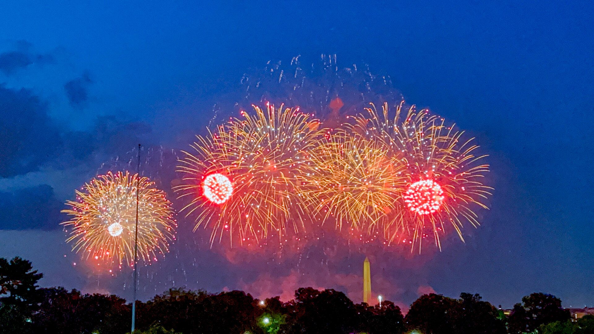 A display of fireworks at night.