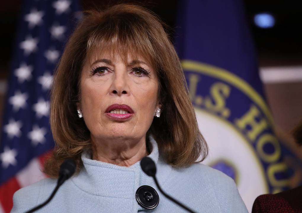 A woman in front of a microphone.