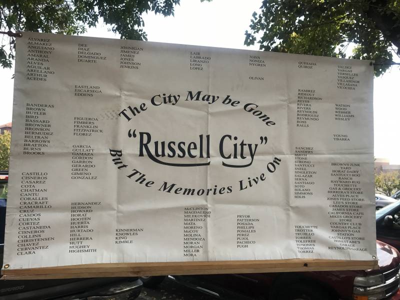 A board reads, "Russell City: The city may be gone, but the memories live on."