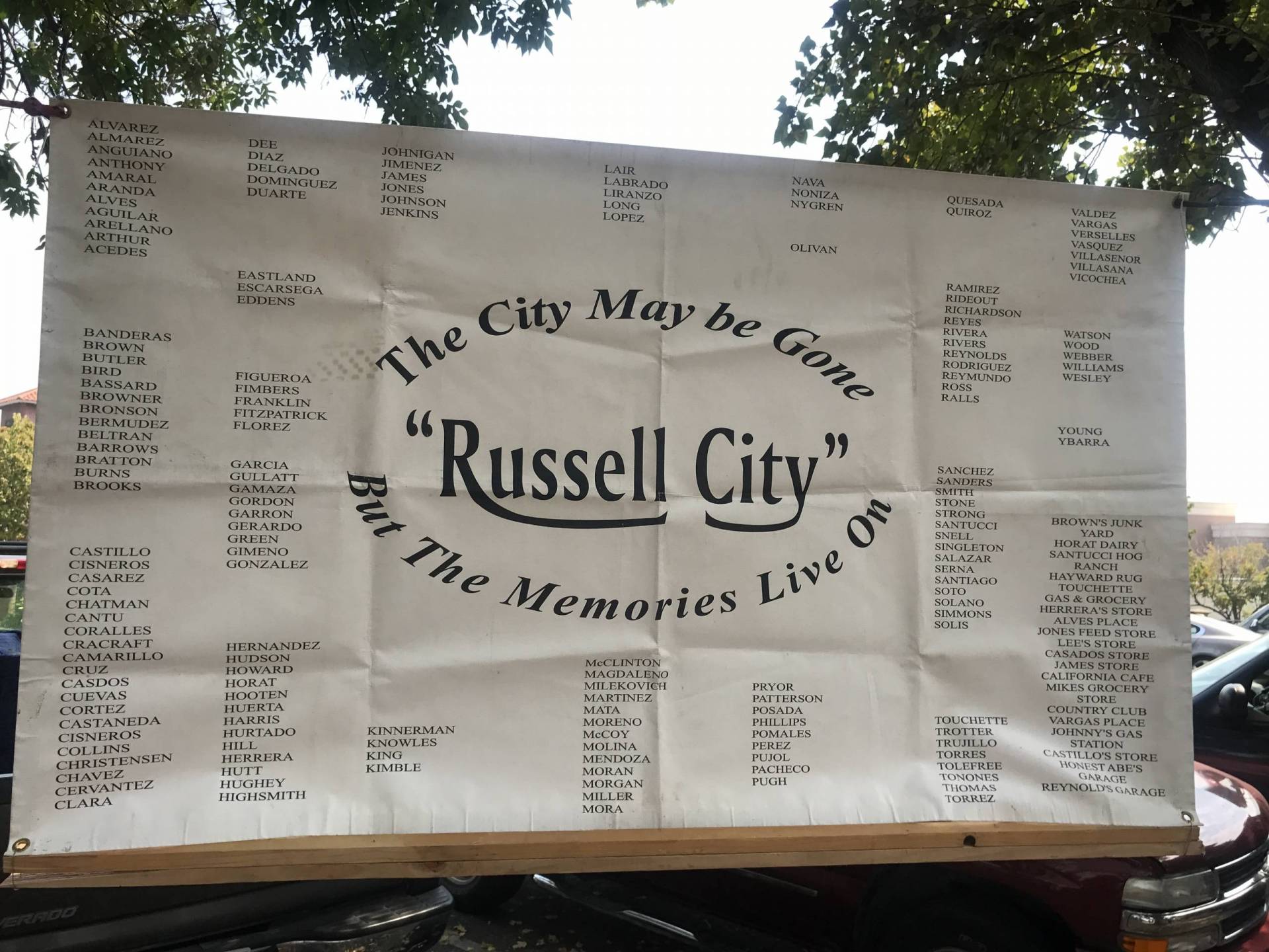 A board reads, "Russell City: The city may be gone, but the memories live on."