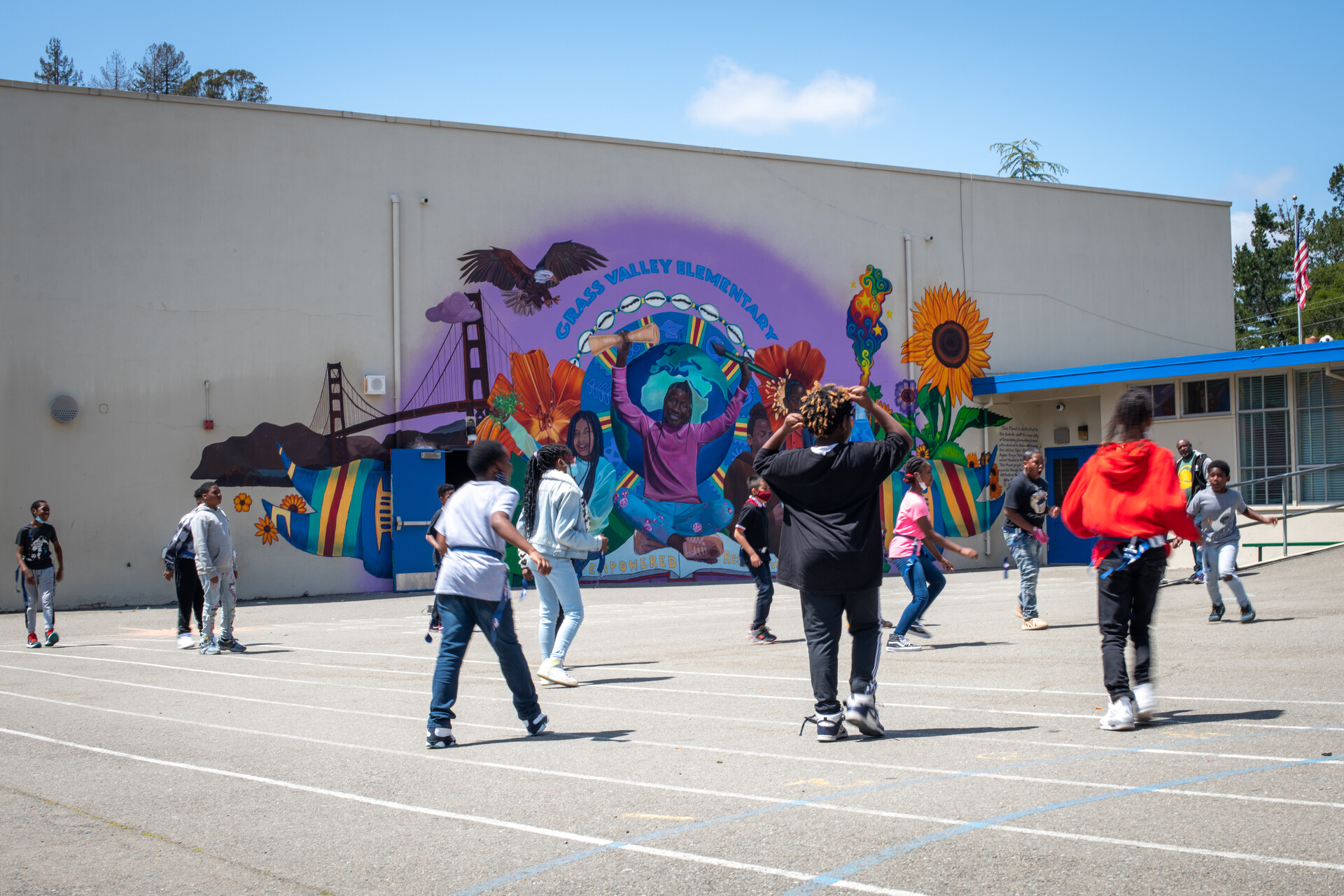 Kids play outside at school.