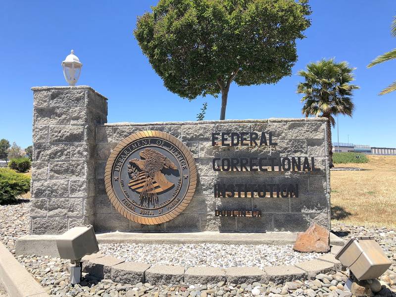 An entrance sign that says, 'Federal Correctional Institution Dublin CA.'
