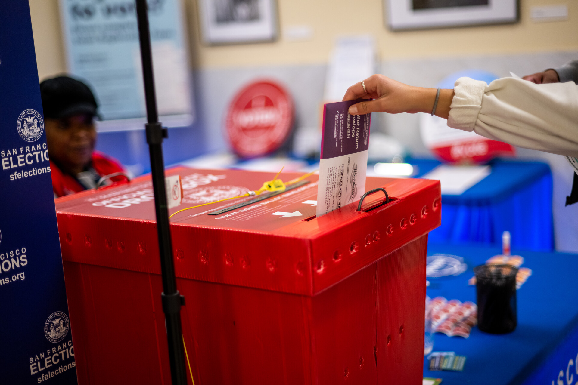 A voter seen dropping off a ballot.