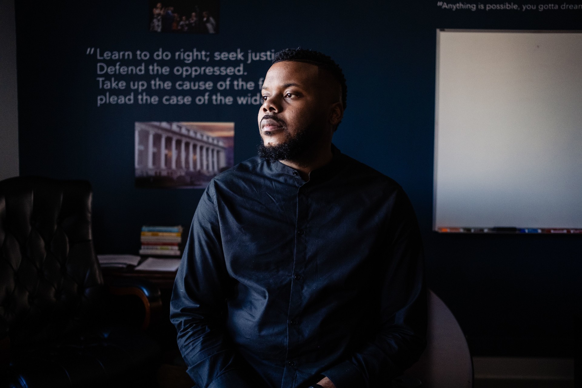 A profile picture of a man looking off-camera to his right.