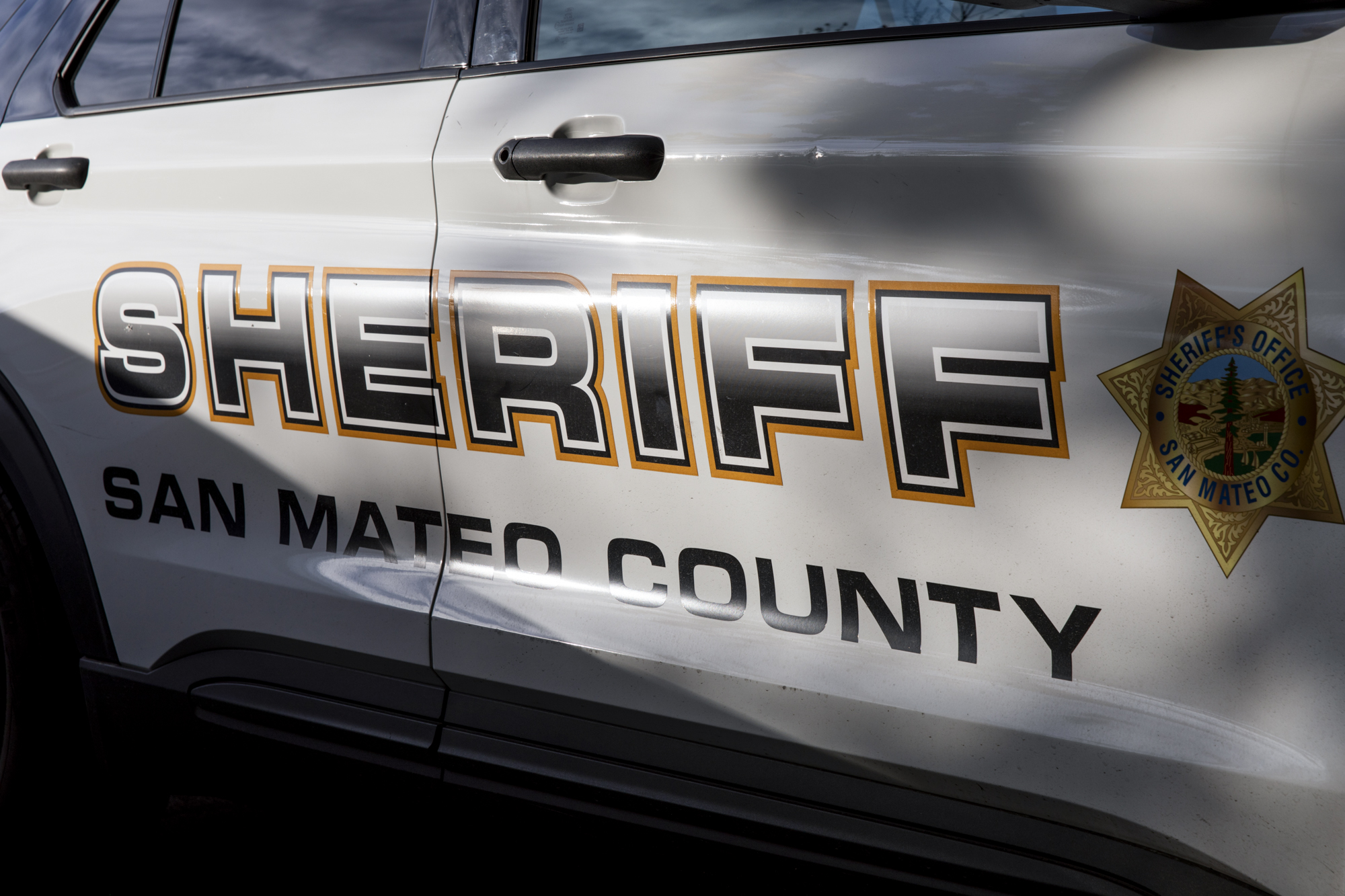 The side of a police car.