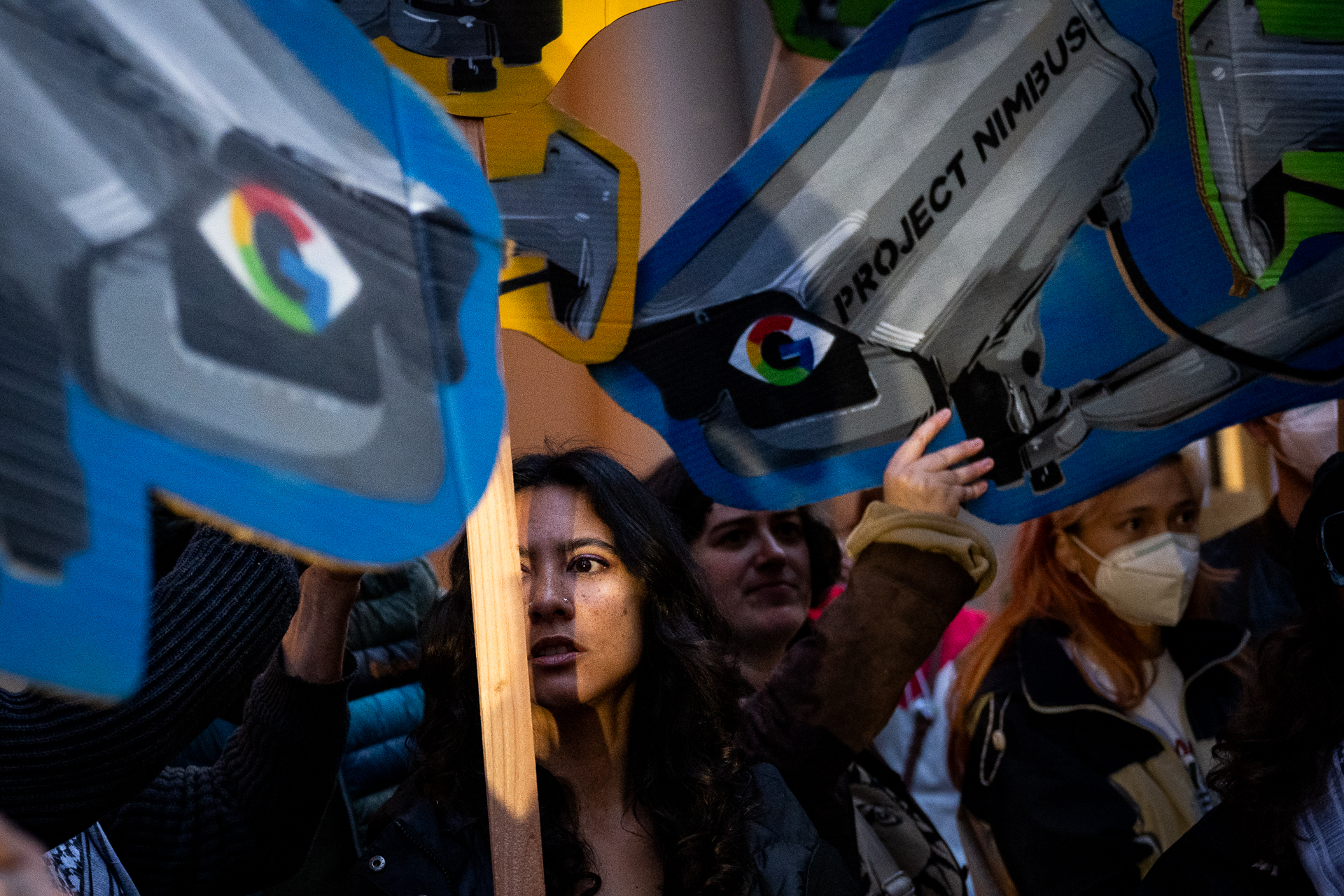 Protesters with flags and banners.