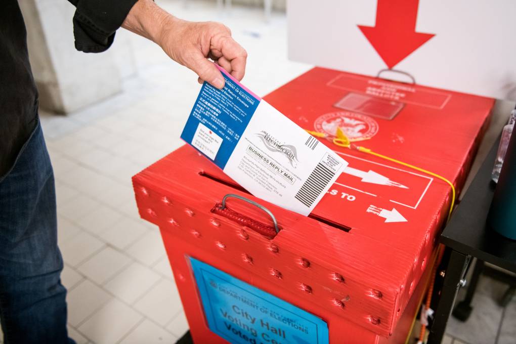 A bright red ballot box.