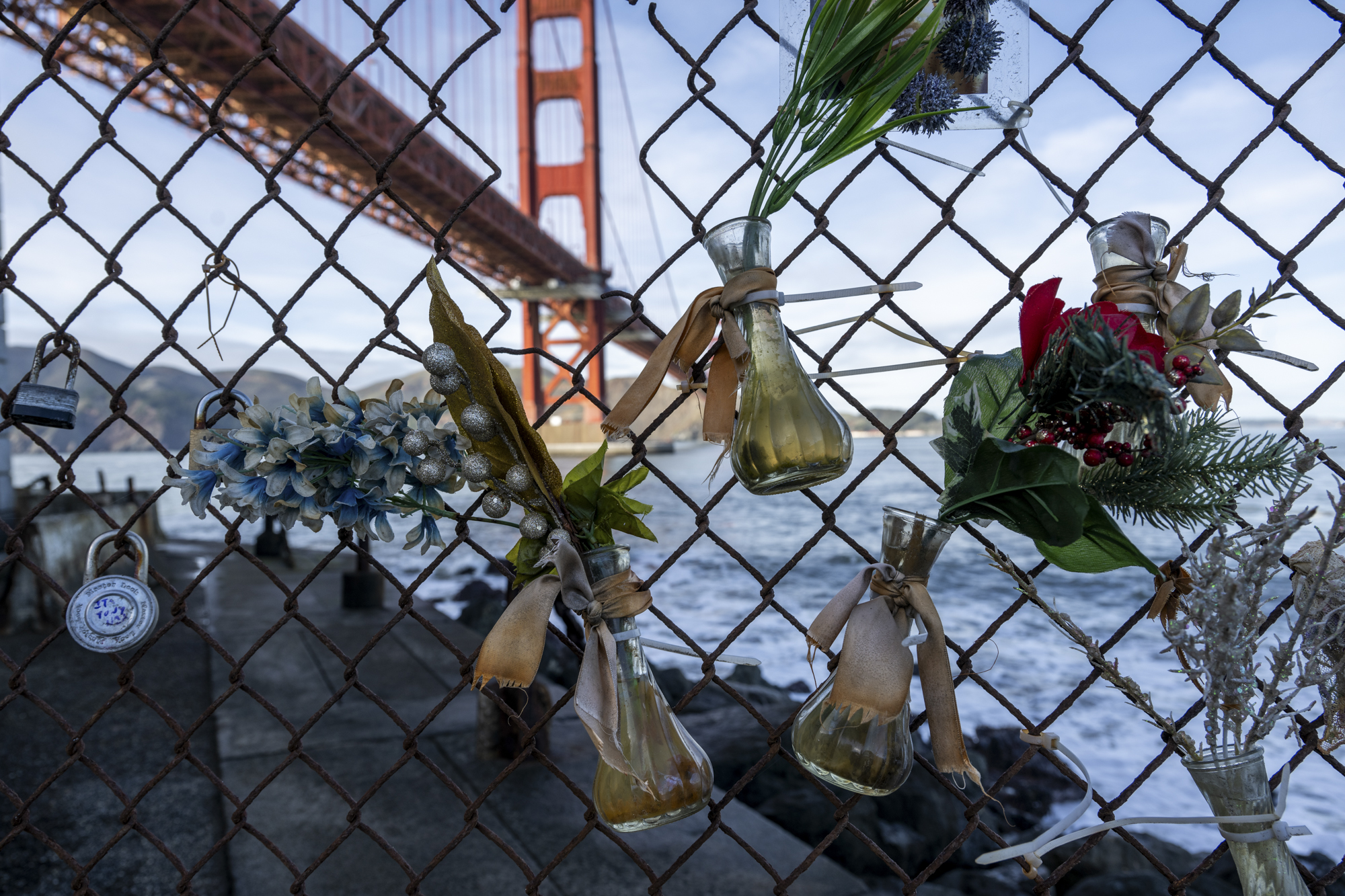 A memorial to suicides with the Golden Gate Bridge in the background. 