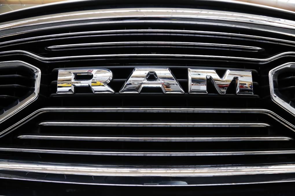 A close-up image of the grill of a Ram truck.