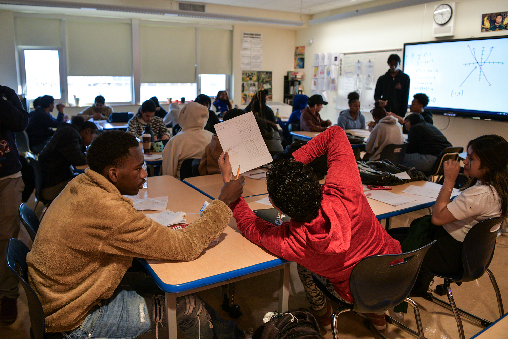 Students and instructors in a classroom setting.