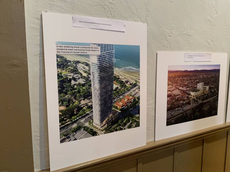 Photos of development on a wall in display
