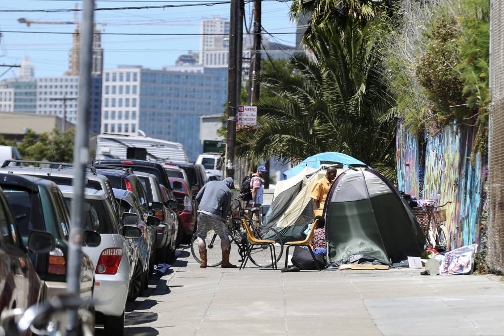 A wide San Francisco with a tent encampment.