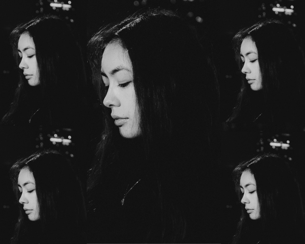 A black and white collage of five images of a side profile of an asian woman looking down.