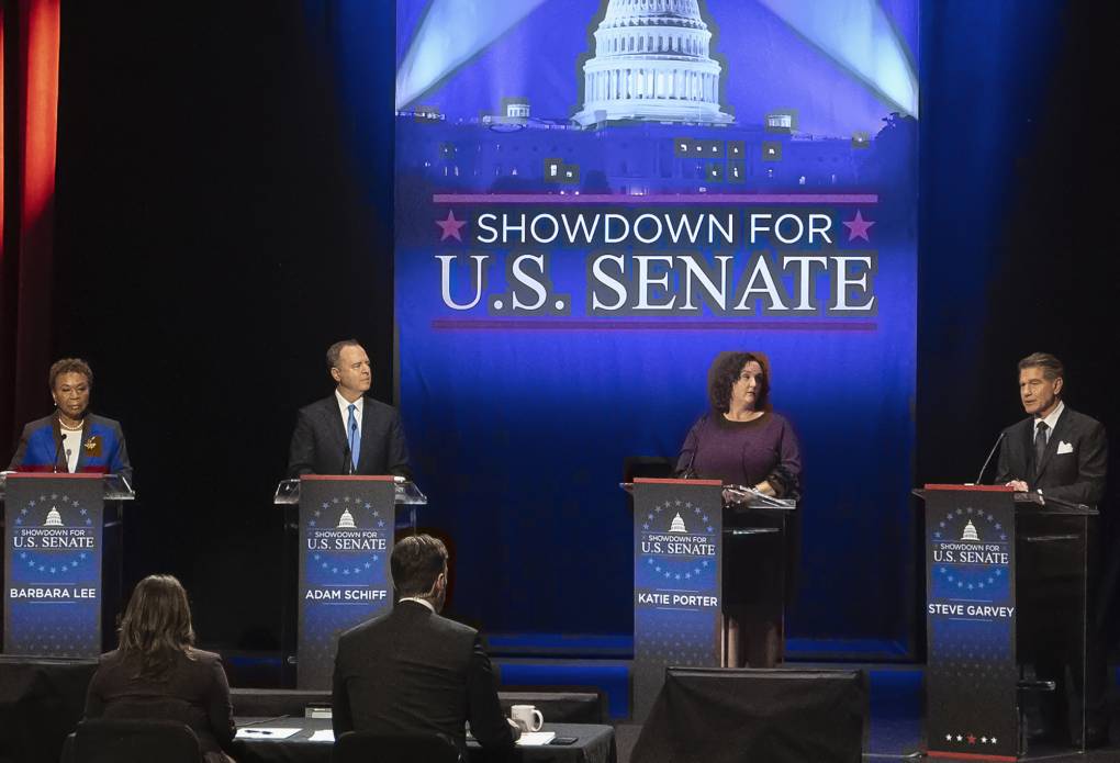 U.S. Senate candidates in California are standing behind stage podiums.