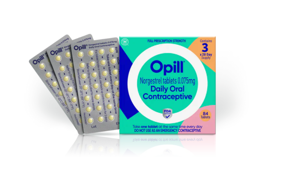 A box of medicine, called Opill in a turquoise case.