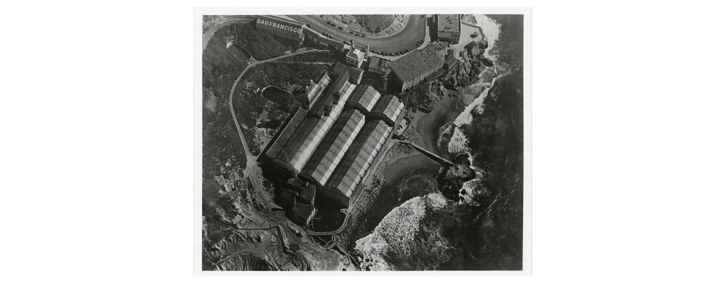 Black and white aerial view of the massive Sutro Baths pavilion.