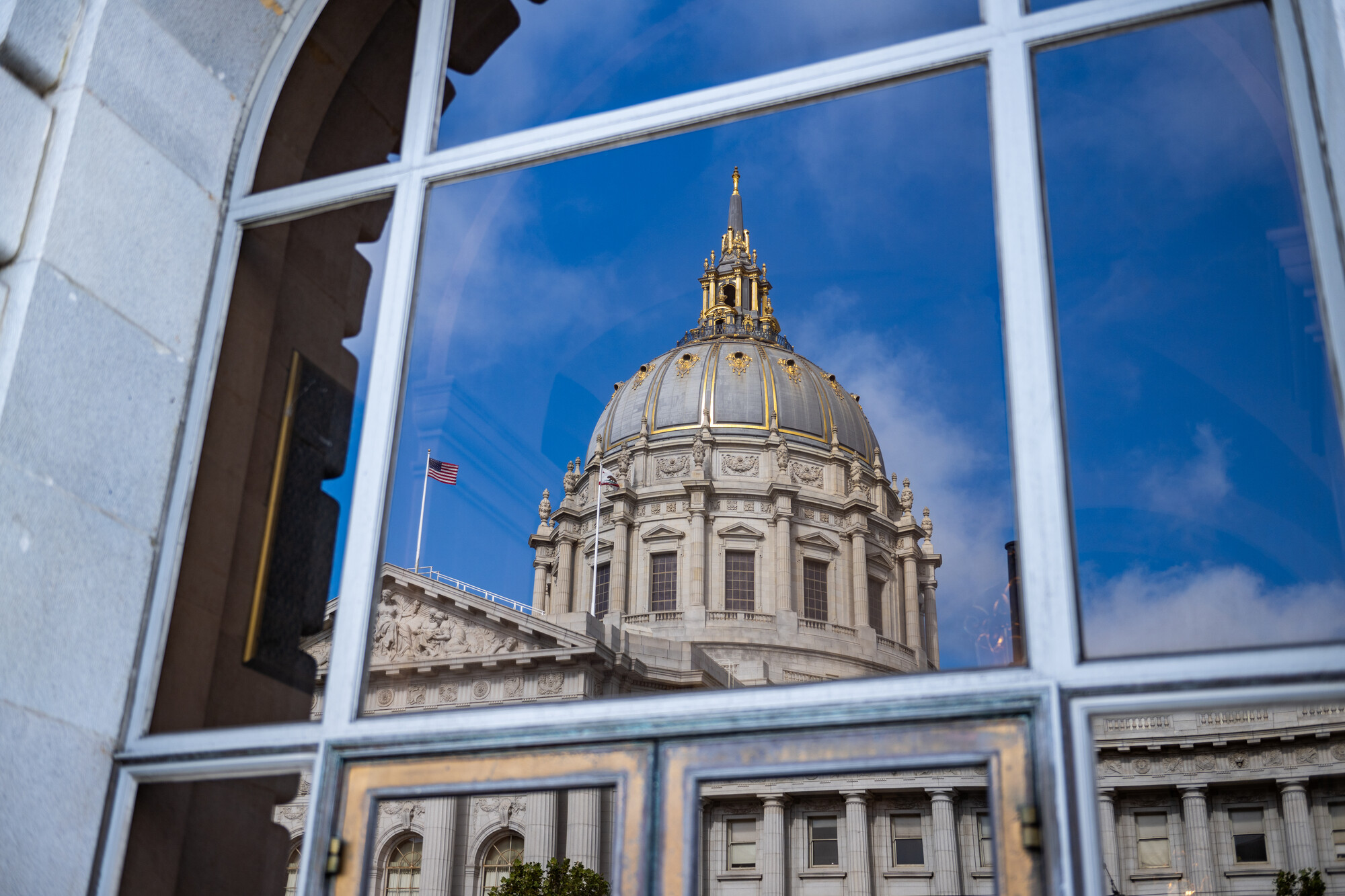 Reflection of a building in a window.