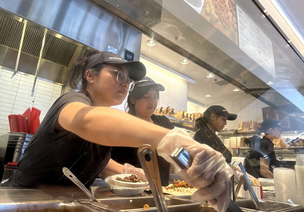 California governor promotes higher minimum wage for more jobs in fast food industry