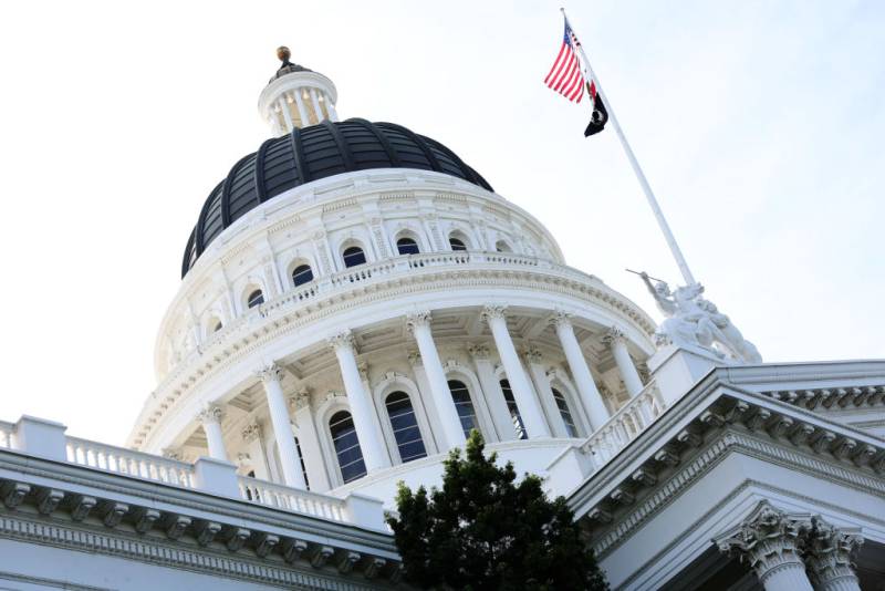 An upward view of the California state capitol building.