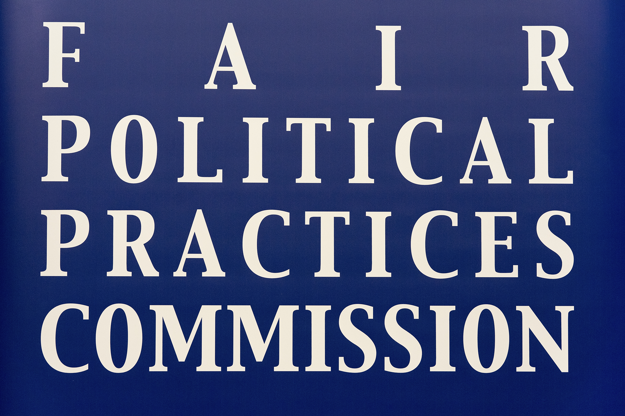 A blue illustration that reads "FAIR POLITICAL PRACTICE COMMISSION."