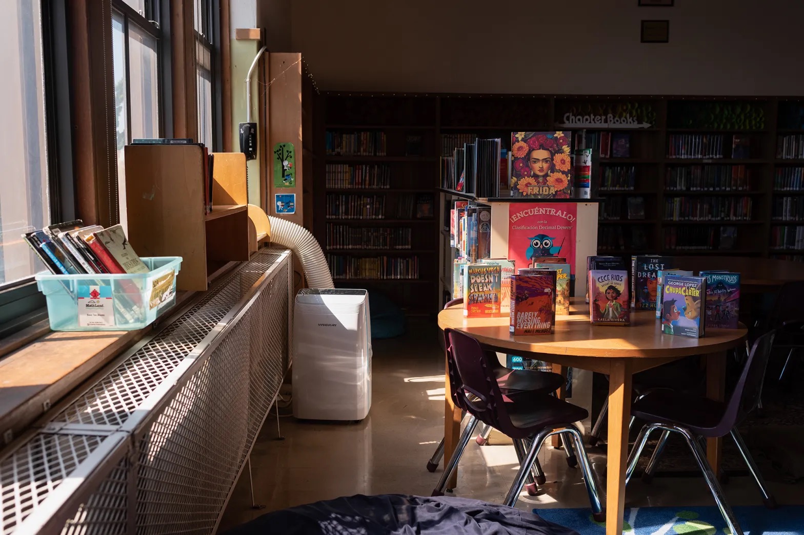 A portable air conditioner in a classroom.
