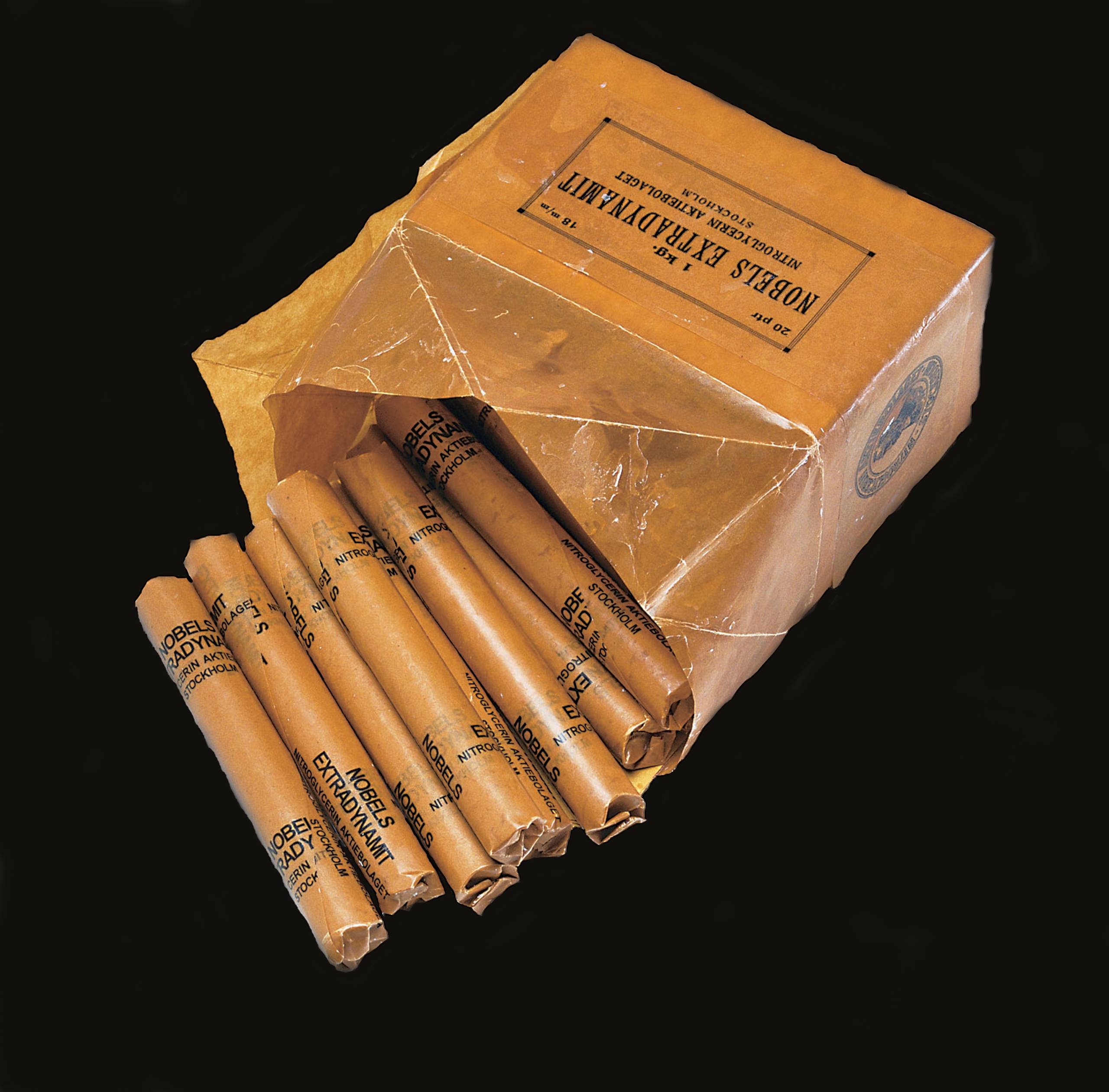 A tan box of cigar-like forms.