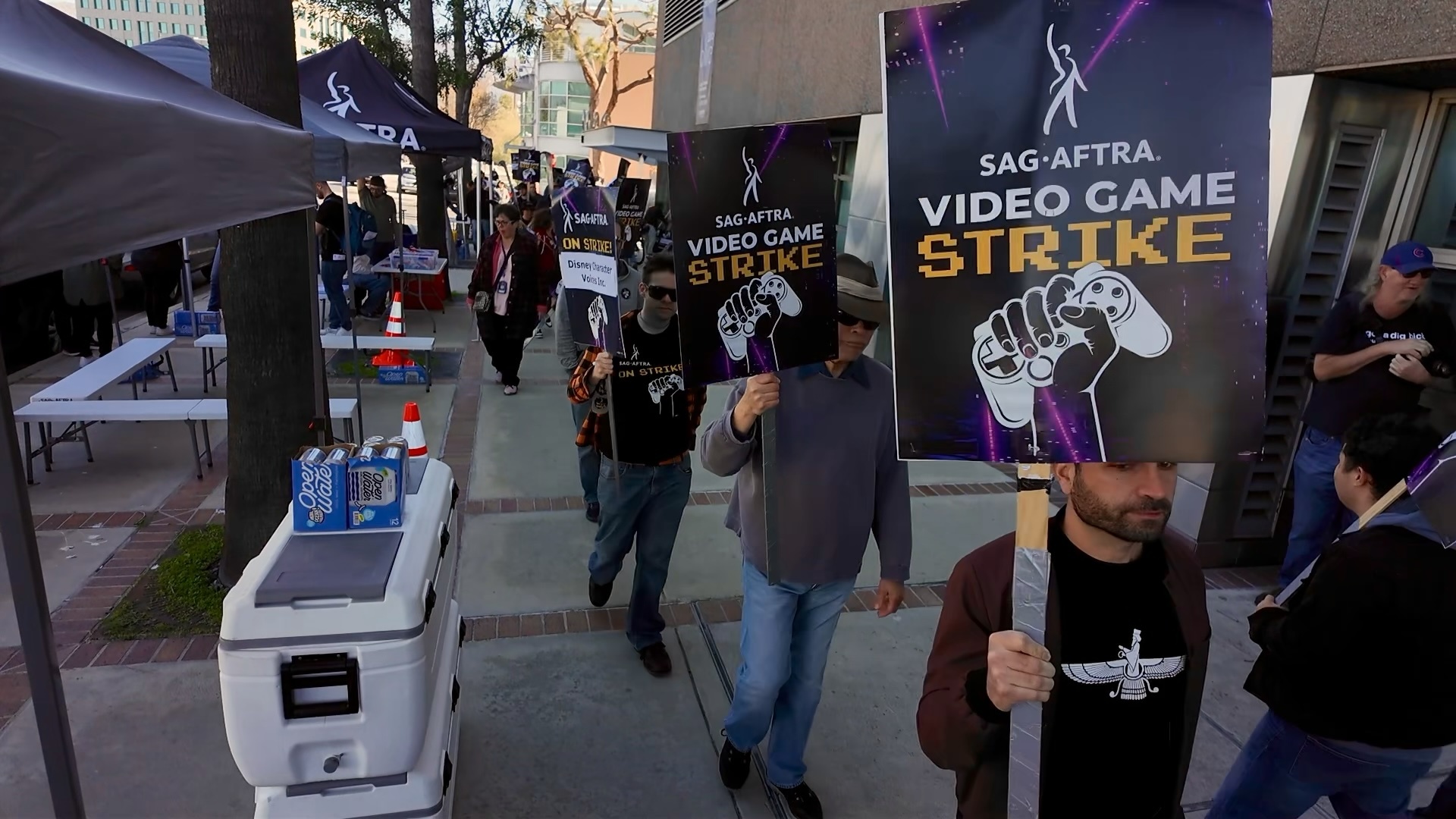 Video game workers strike outside a Disney-owned gaming production office in Burbank, California on March 18, 2025.