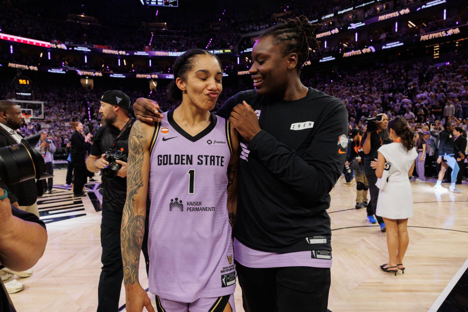 Golden State Valkyries center Aminata Gueye (31) and Golden State Valkyries forward Gabby Williams (1) walk off the court after the Valkyries defeat the Atlanta Dream in game 5 of the WNBA Finals at Chase Center in San Francisco on Oct. 26, 2026. (Juliana Yamada/KQED)
