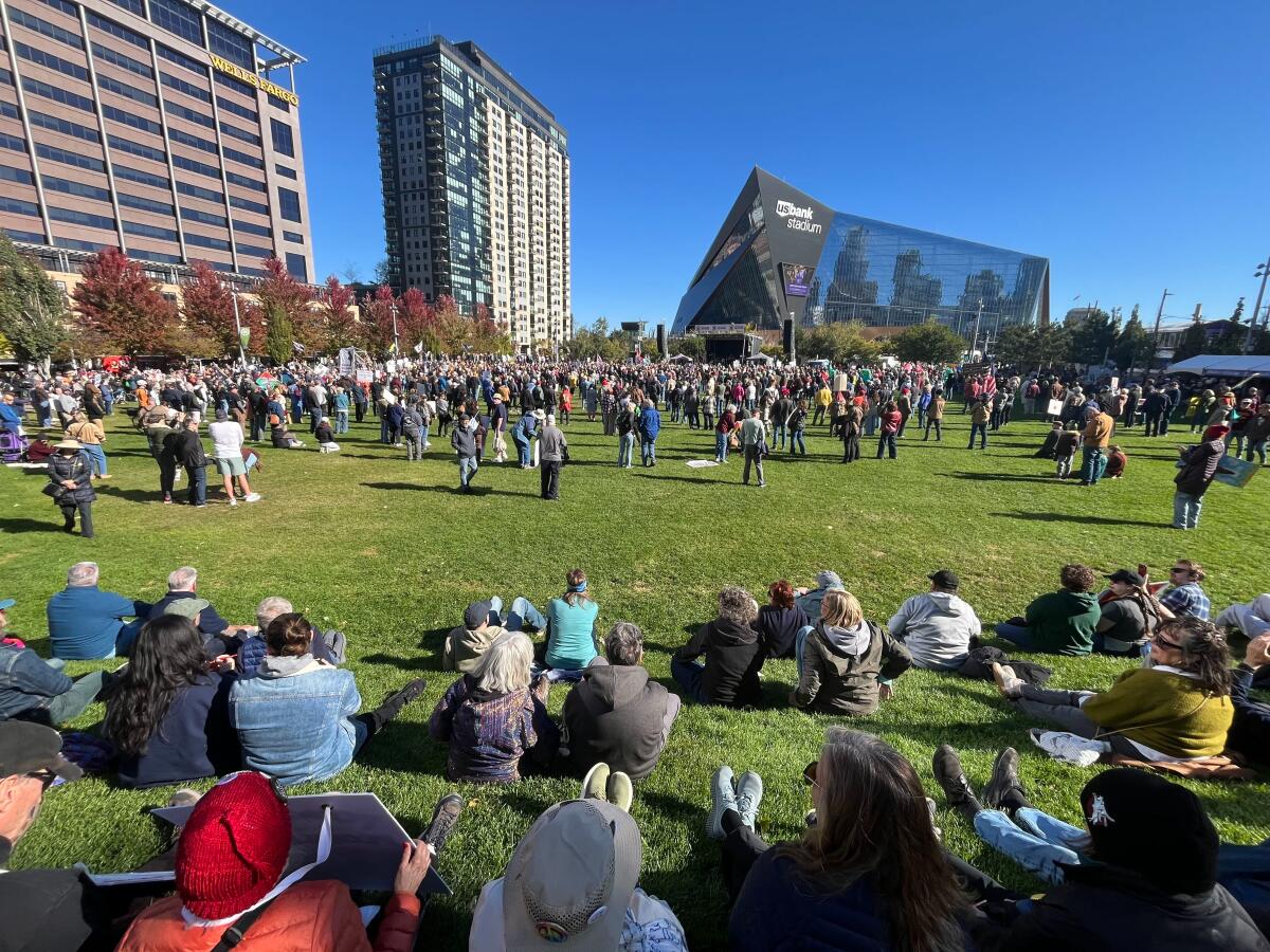 Thousands gathered in The Commons park in downtown Minneapolis as part of the No Kings early vote rally on Saturday, Oct. 17. Speakers including Minnesota Attorney General Keith Ellison and former Minneapolis Mayor R.T. Rybak encouraged attendees to vote early and push their neighbors to do the same.