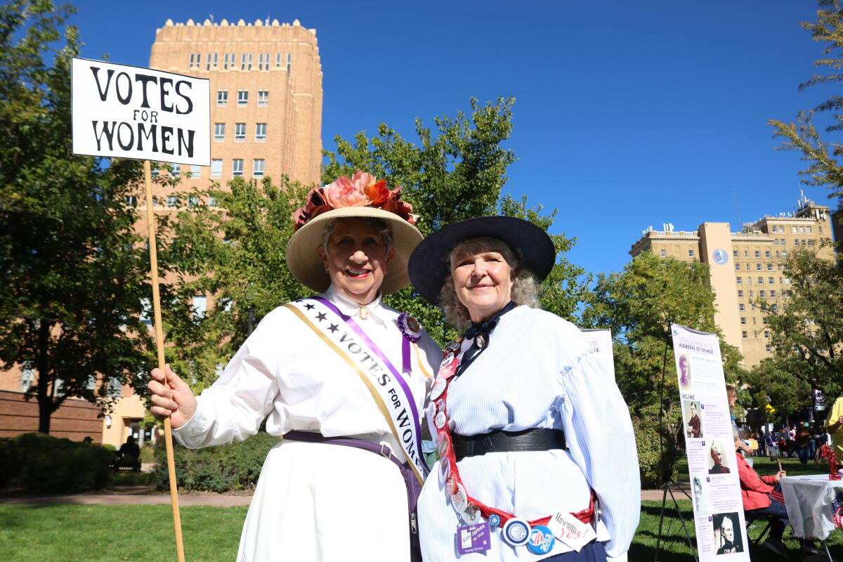 Debra Marin, left, dressed as a suffragist (down to the bloomers), and Carolyn Quinn at a No Kings rally in Ogden, Utah, Oct. 17.