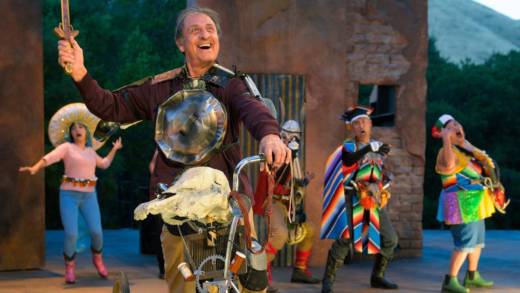 Emilio Delgado (Quijano/Quixote) rides past (background, L–R) Gianna DiGregorio Rivera, Juan Amador, Carlos Aguirre, and Amy Lizardo as calacas in Octavio Solis’ 'Quixote Nuevo' at California Shakespeare Theater.