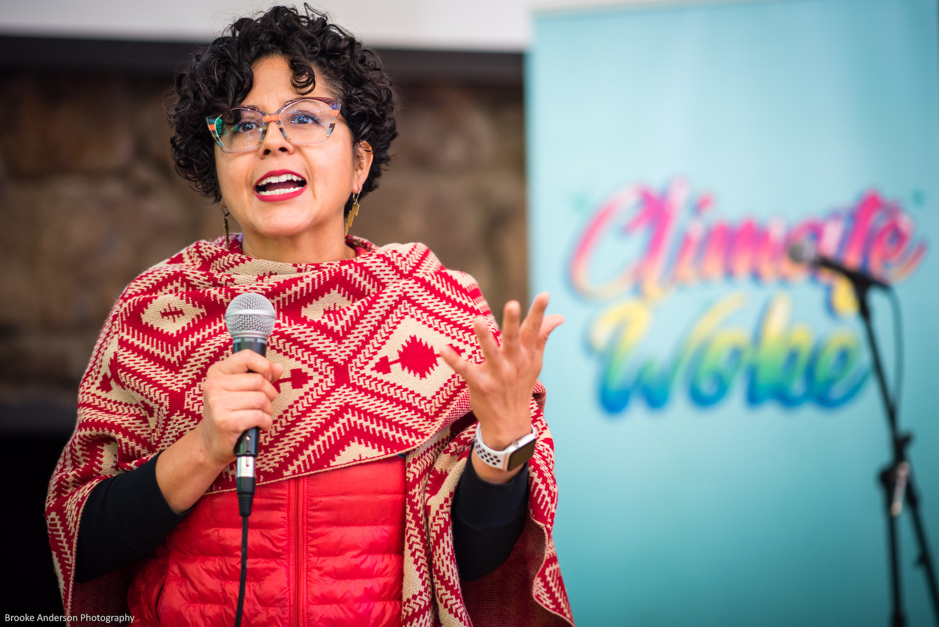 Woman in red outfit with microphone