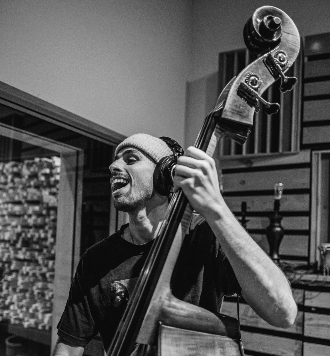 A black and white photo of Giulio Xavier Cetto playing the upright bass.