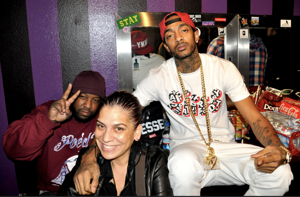 Cultural historian and photographer, D-Ray (center) takes a photo with the late legendary MCs The Jacka (left) and Nipsey Hussle (right) backstage at the New Parish in Oakland in 2013.