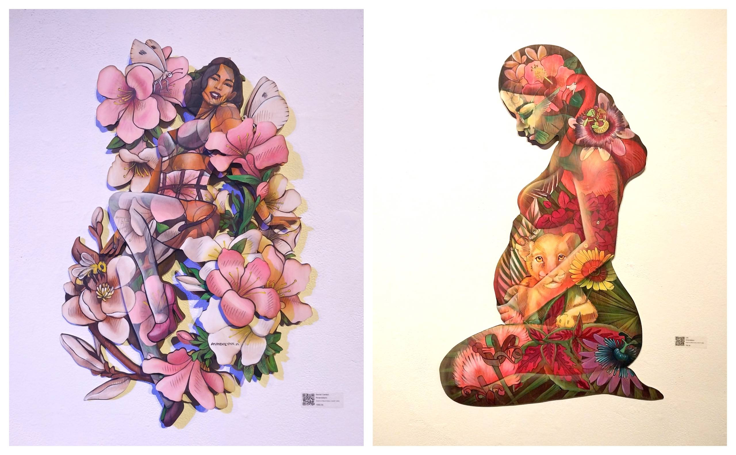Paintings of a woman in her underwear posed amongst a bouquet of soft pink and white flowers, and a painting of a pregnant woman kneeling down and holding her belly which contains an image of a lion cub.