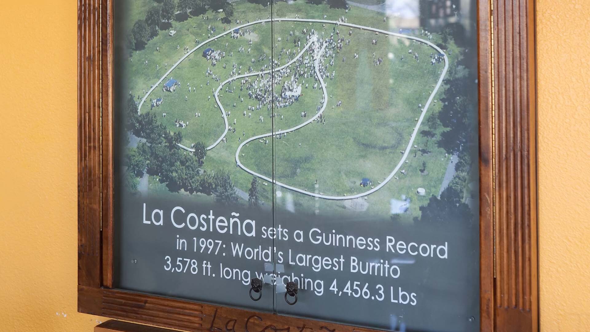 a photo of the world's largest burrito in 1997 wrapping around an entire park in Mountain View, California