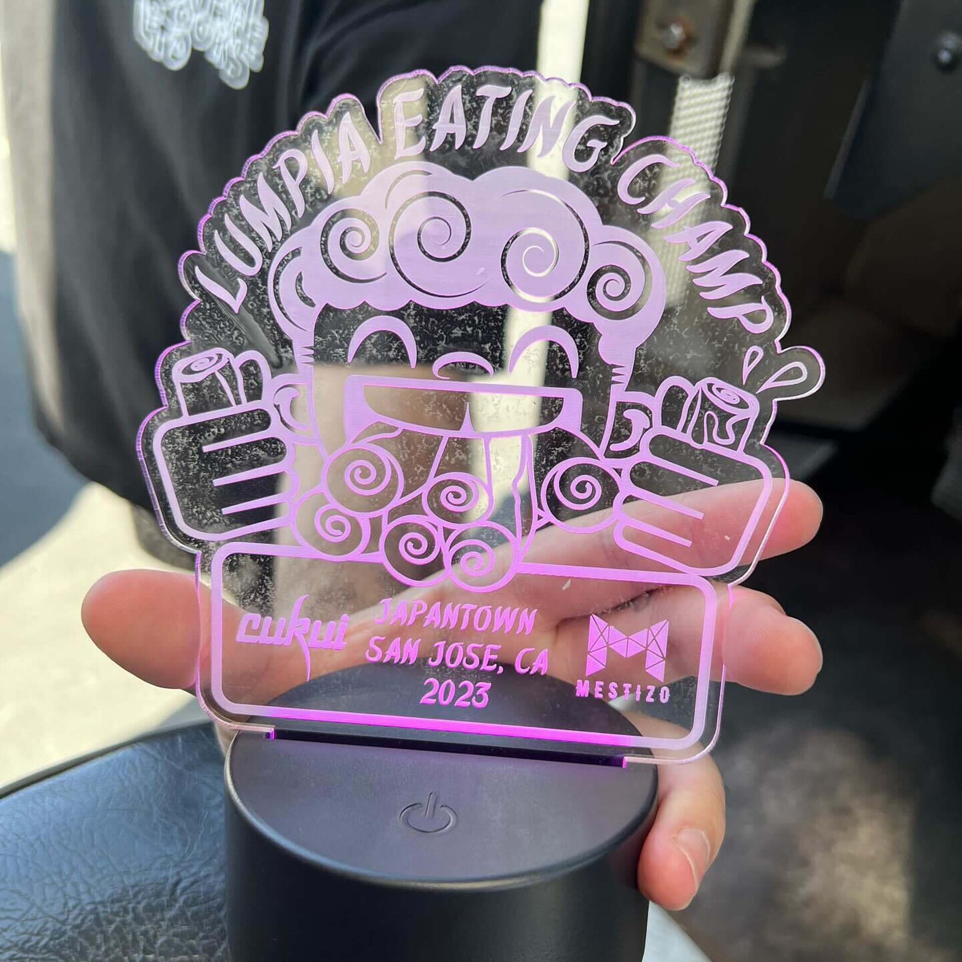 a custom-made award trophy for the winner of the lumpia eating contest in San Jose