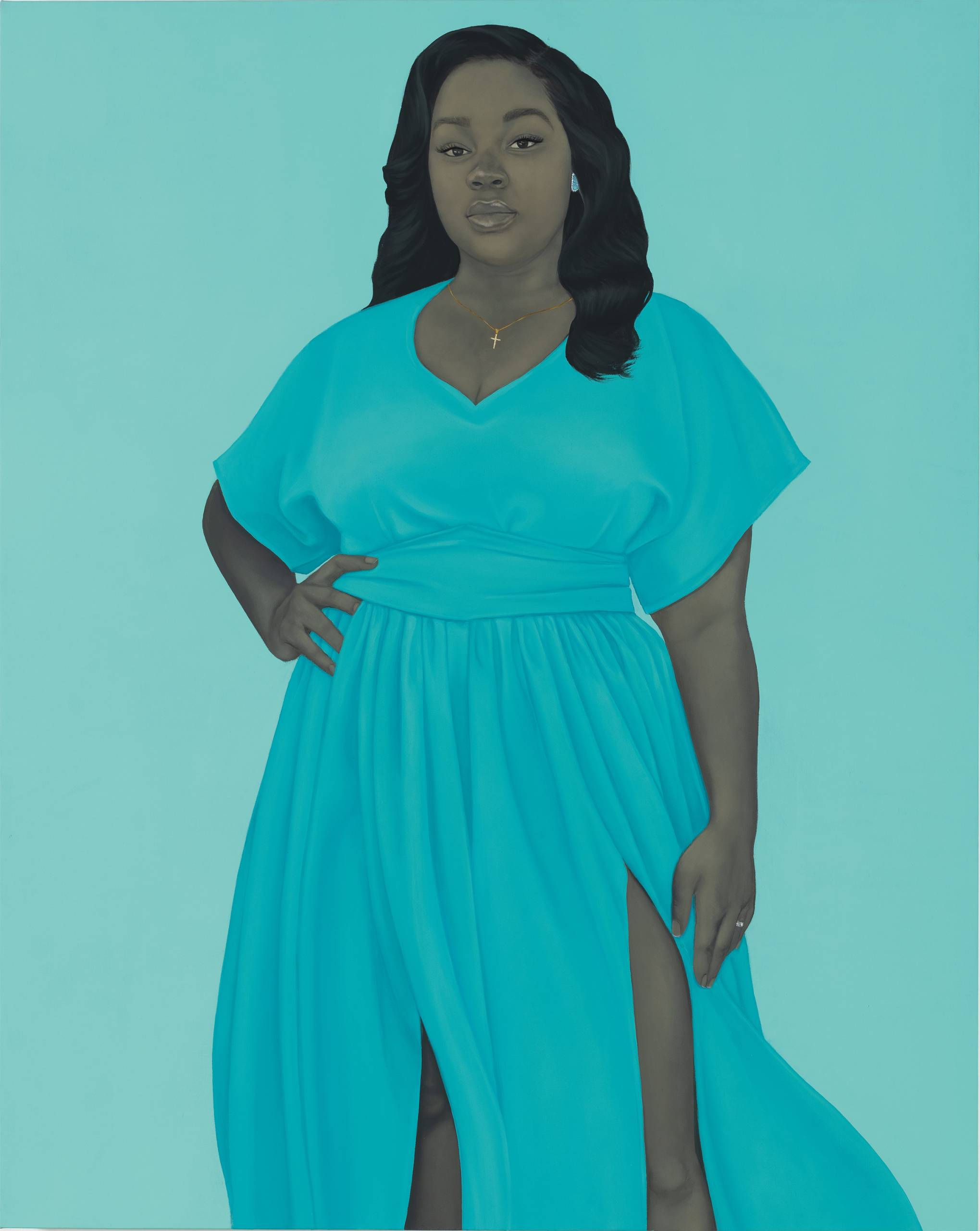 portrait of woman in turquoise dress against turquoise background