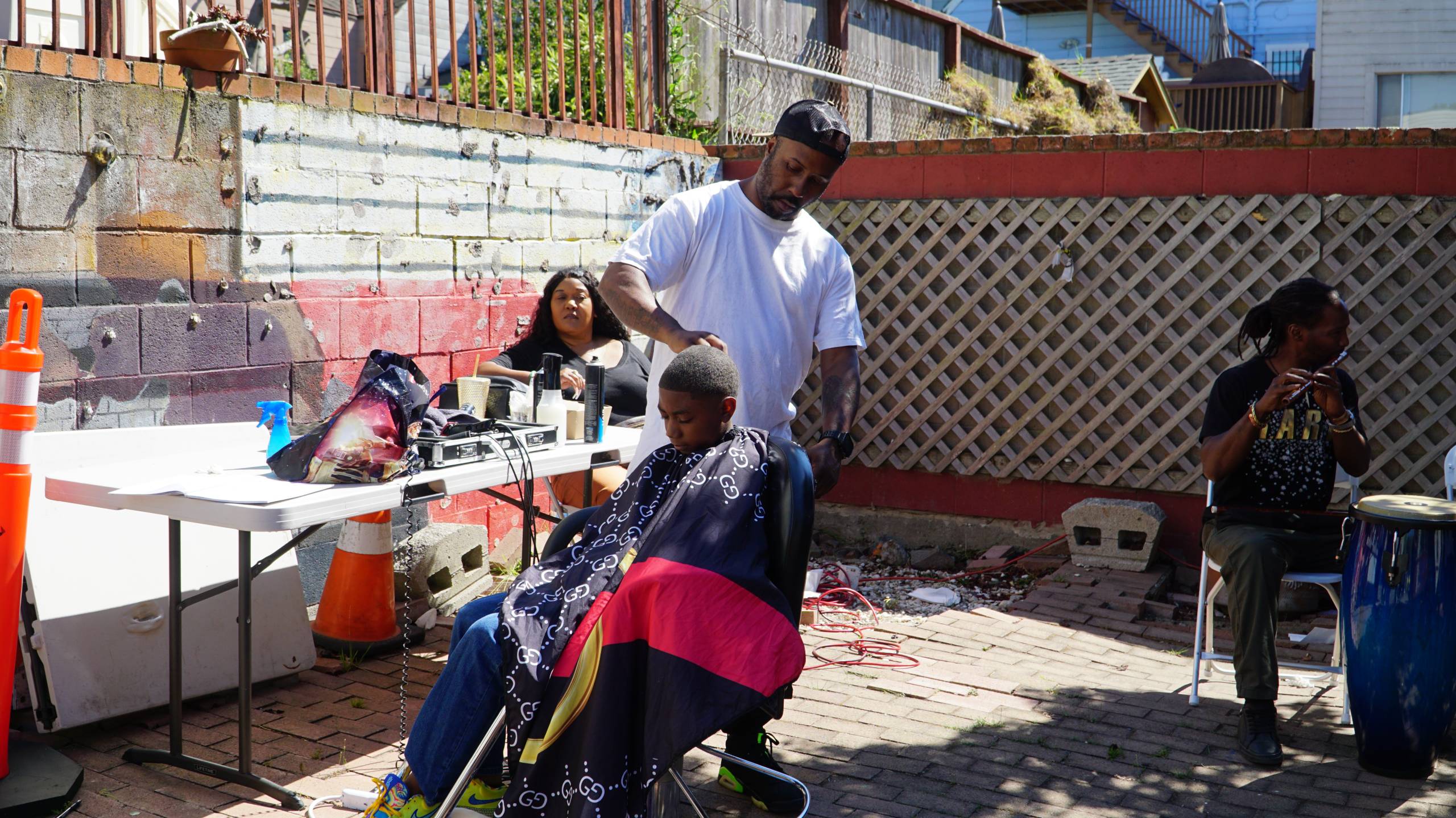 EBlendz da Barber offers free haircuts to people at the Pop-Up Village.