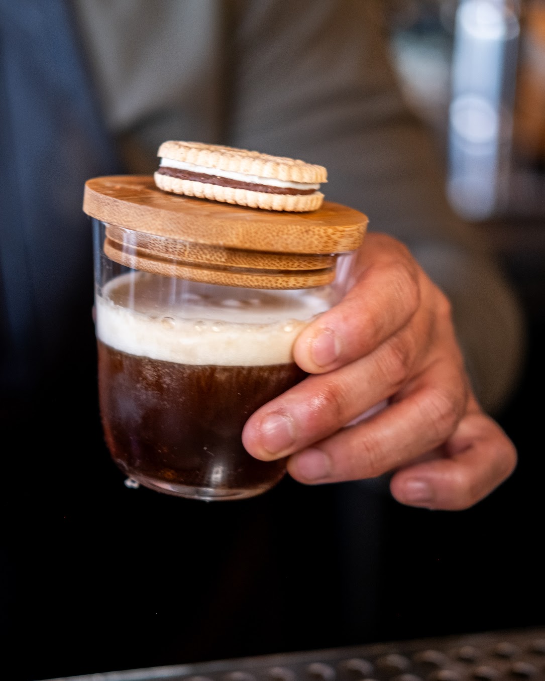 a cocktail made using ingredients from Girl Scout cookies is displayed at a bar
