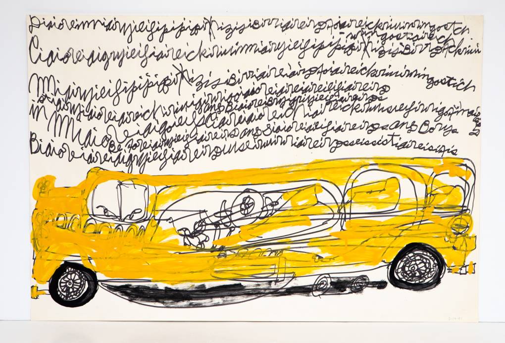 rows of cursive letter above a yellow bus