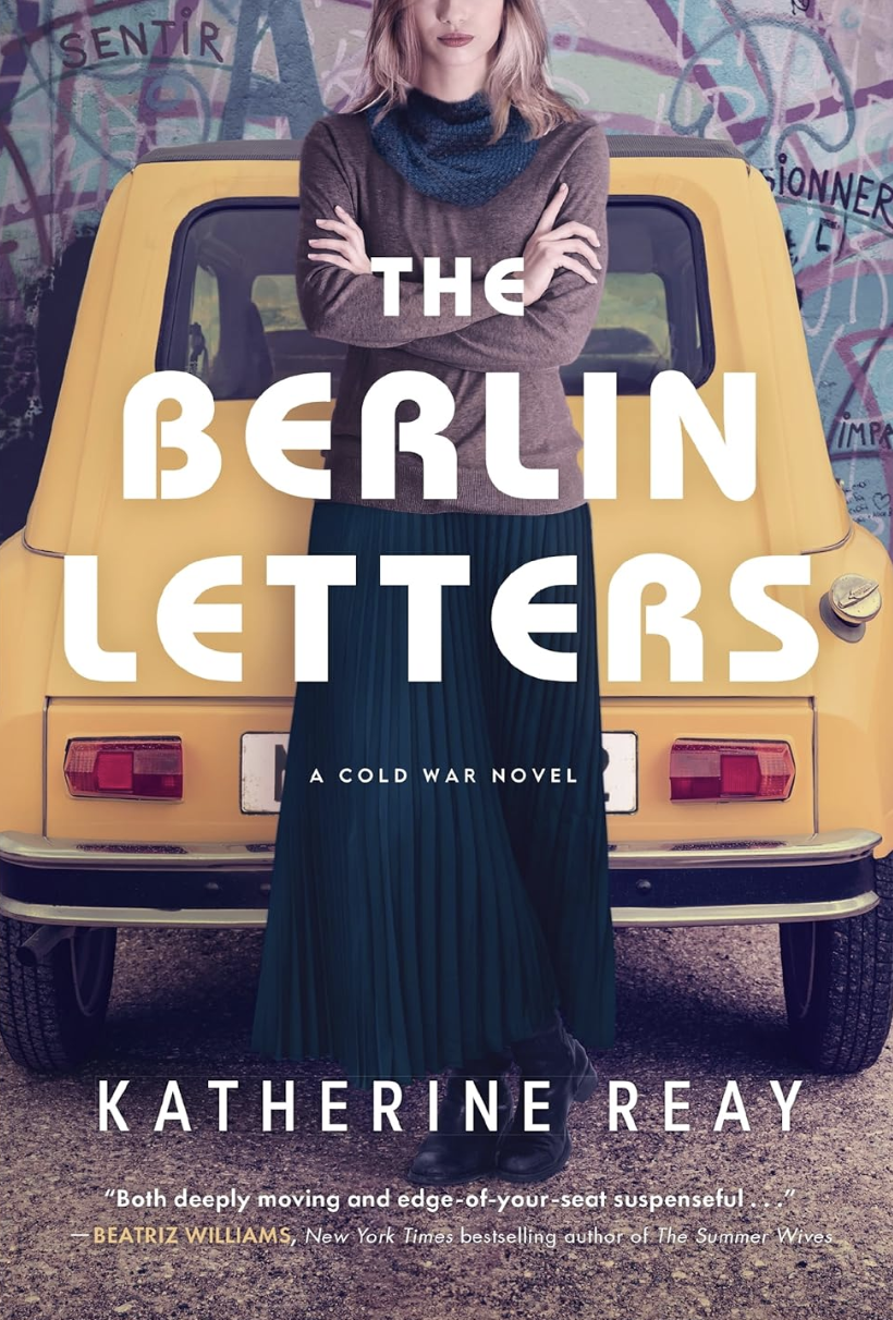 A book cover depicting a woman dressed in conservative 1980s-era clothing stands, arms folded in front of a small yellow car and a wall of graffiti.