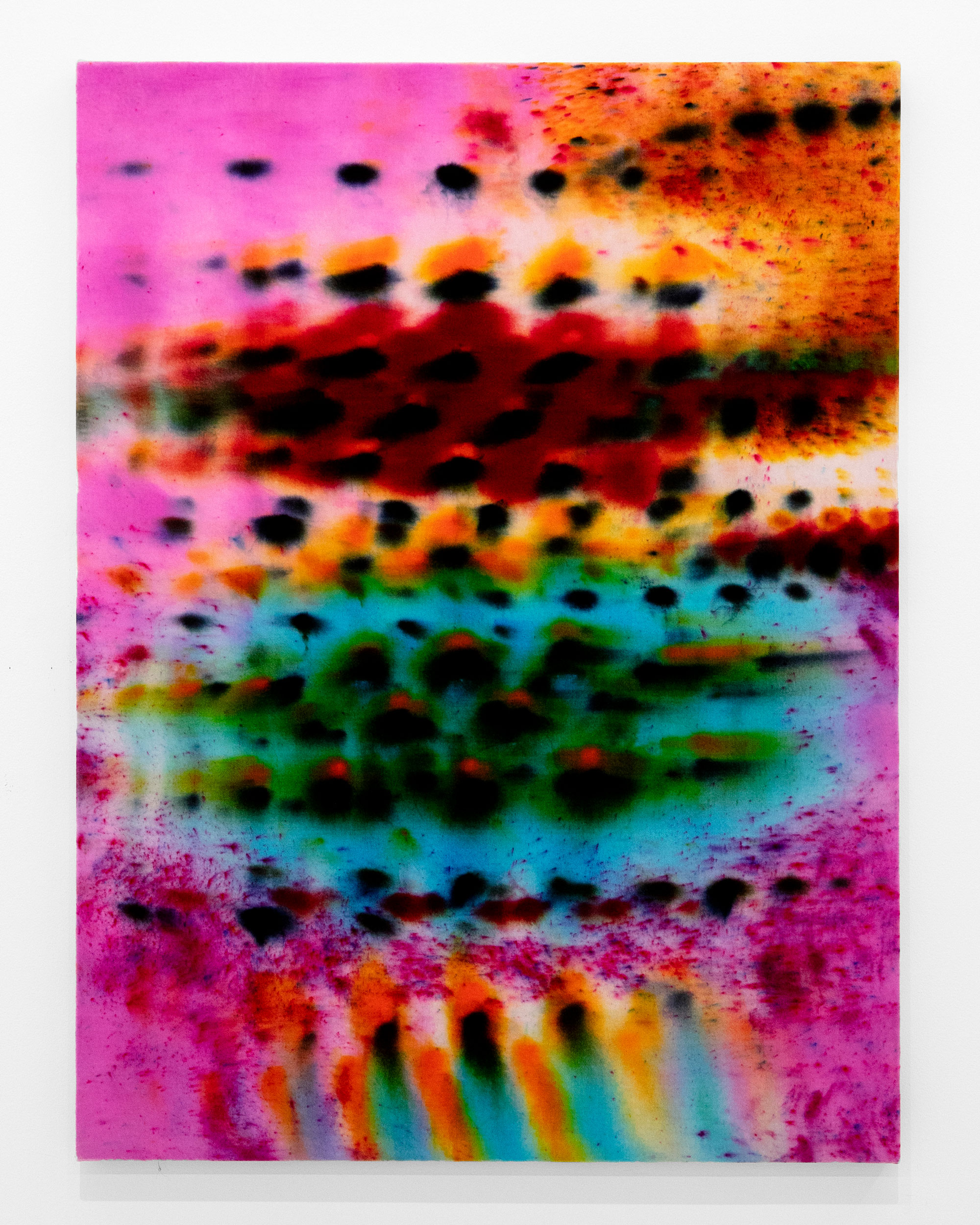 Abstract painting of diffuse, blurry dots with bright colors of pink, teal and yellow