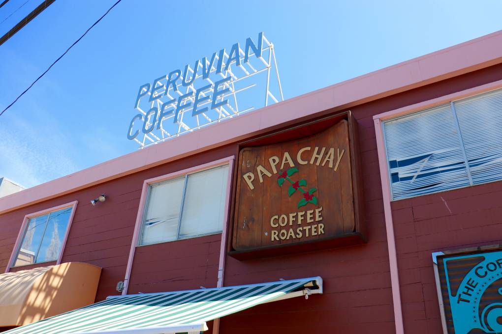 a Peruvian cafe's exterior announces "Peruvian coffee"