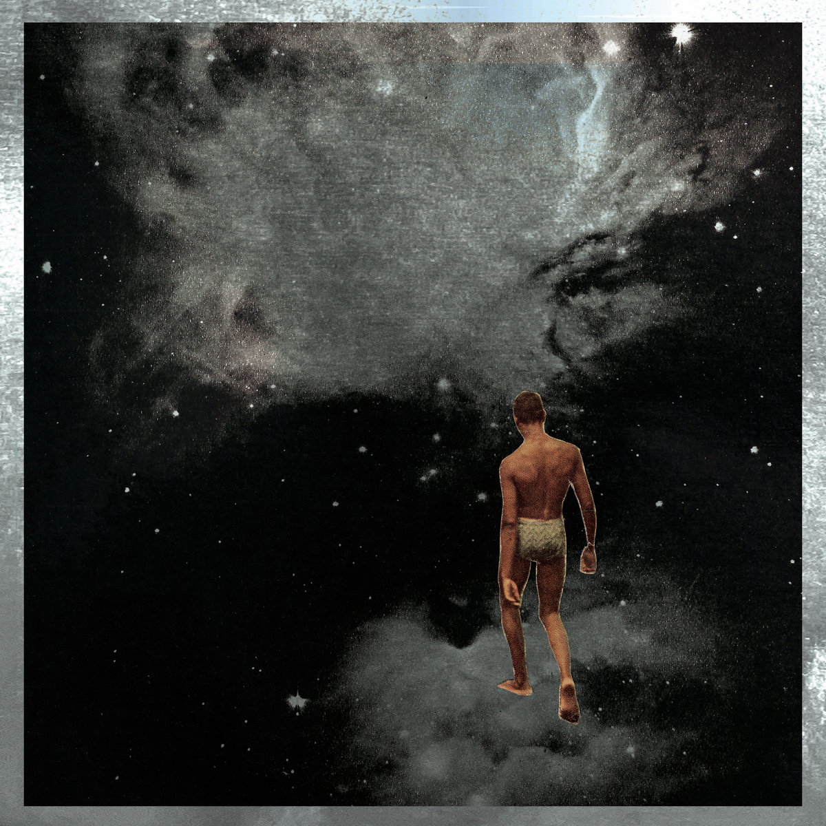 A composite image of a man, seen from behind, walking into the galaxy of stars and nebulae