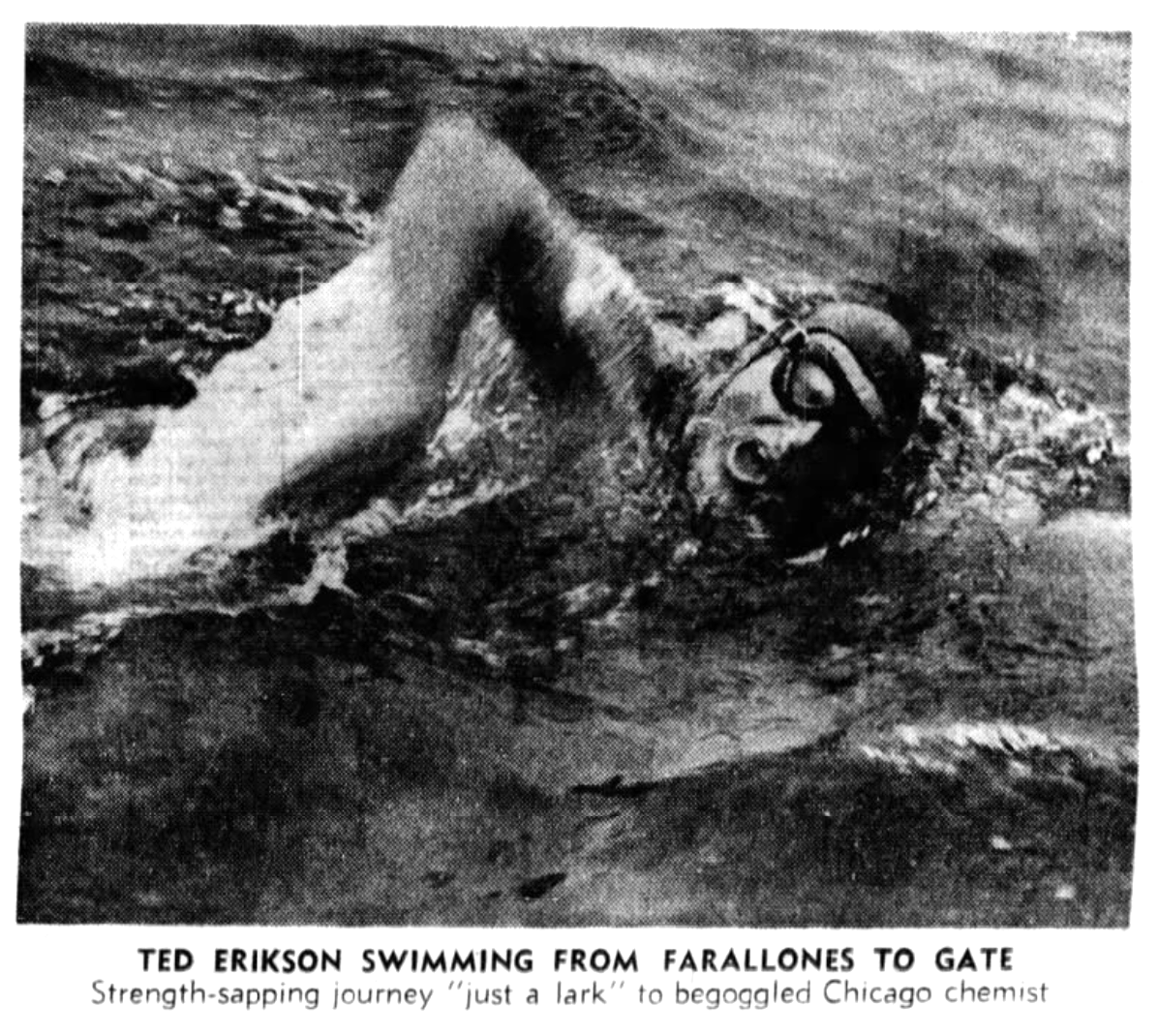 A man in 1960s-era swimming cap and goggles swims aggressively in the ocean.